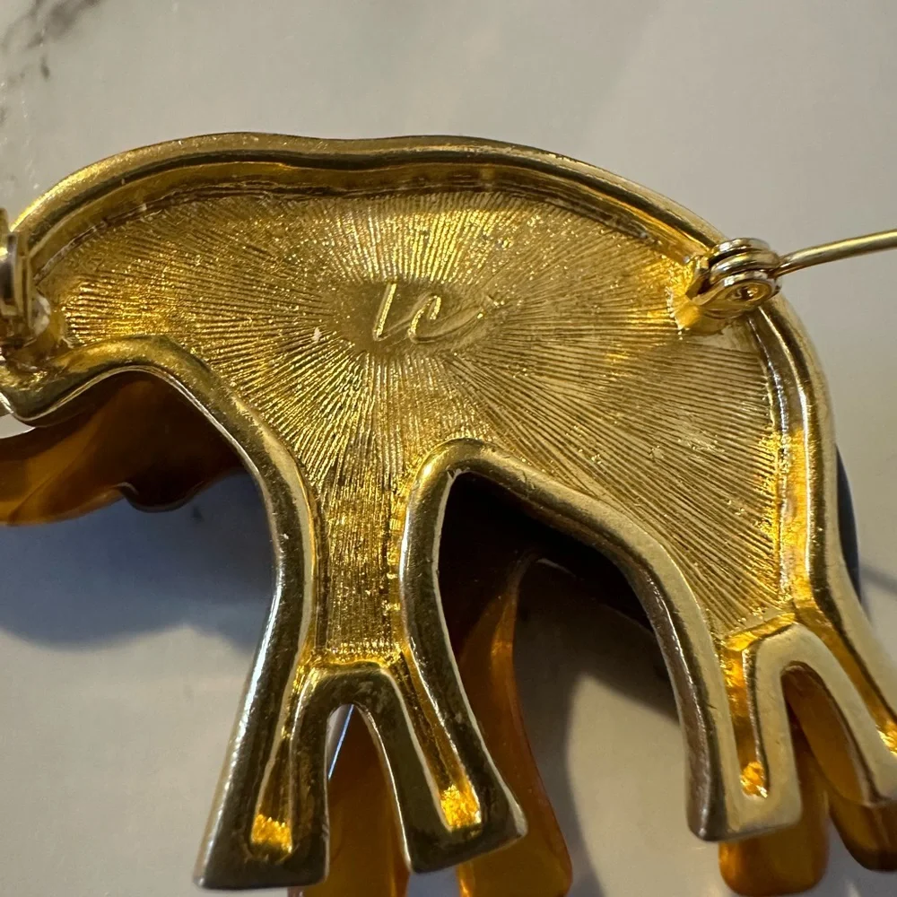 Liz Claiborne faux tortoise‎ and gold tone elephant brooch